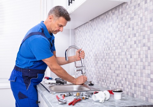Local Plumbers Working on Sink in Peoria IL