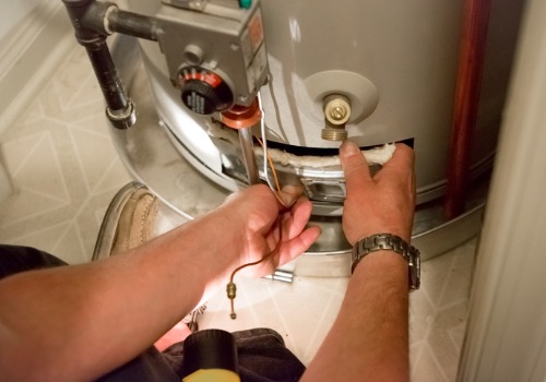 Person working with Water Heater Installation in Peoria IL