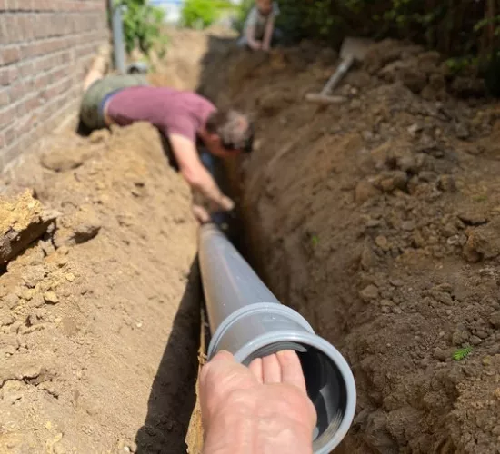 Members of Reading Plumbing restore a sewer as part of the sewer services they offer