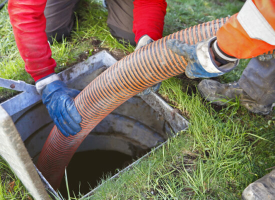 Sewer Cleaning East Peoria IL, Workers cleaning cesspit